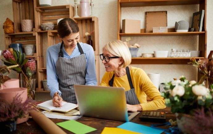 mother and daughter working in family business